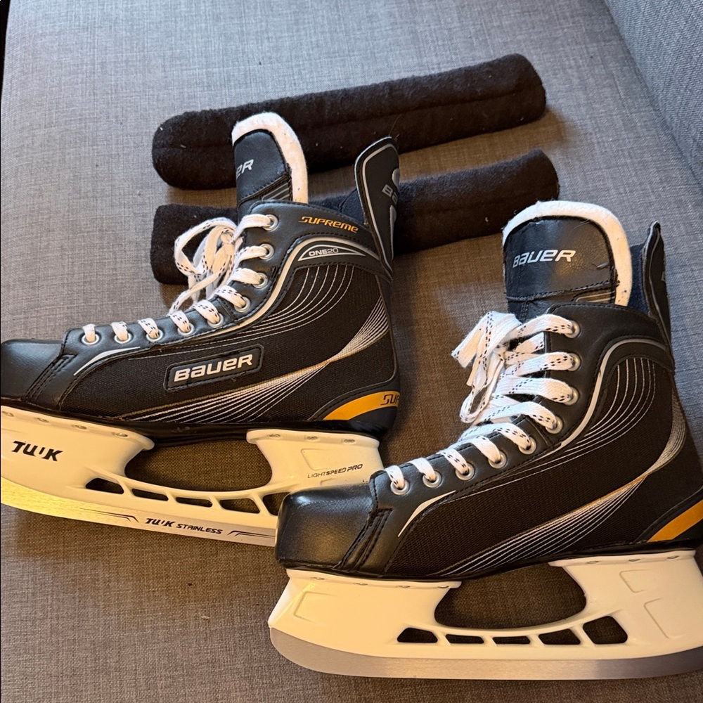 Bauer Black and White Hockey Skates with Yellow Accent